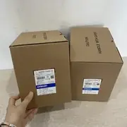 Omron 3G3MX2-A4040-V2 MX2 V2 inverter in its shipping carton with the type label visible