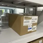 Omron 3G3MX2-A4055-V2 5.5 kW VFD - top view showing the model-number label with '3G3MX2-A4055-V2' designation, V2 firmware version, and the parameter-set sticker showing the factory-default values