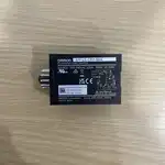 Omron 61F-LS-CP11-NRA — base face showing the socket-mount pin layout label and the rotation-stop tab