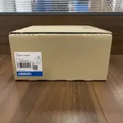 Omron C200HW-PA209R — screw-terminal block with LG, GR, and RUN output terminals visible