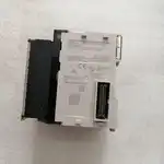 Omron CJ1W-AD081-V1 — top label close-up showing the part number, the 8-channel analog input marking, the 1/8000 resolution, and the CJ1W certification marks