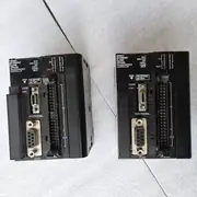 Omron CJ1W-CPU22 — top label close-up showing the part number, the 10K-step program capacity, the CJ-series certification marks, and the USB programming port location