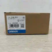 Omron CJ1W-ID231 32-point input unit — side view showing the CJ bus connector strip on the left for mounting on the CJ-series backplane, and the unit-width 31 mm slim form factor