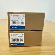Omron CJ1W-ID232 32-point input unit - side view showing the CJ bus connector strip on the left for mounting on the CJ-series backplane, and the unit-width 31 mm slim form factor