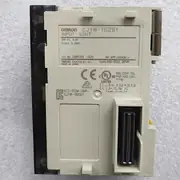 Omron CJ1W-ID261 — top label close-up showing the part number, the 24 VDC / 4.1 mA per point rating, and the slot number area on the housing face