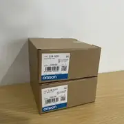 Omron CJ1W-OC201 relay output unit — top view showing the model-number label with the 'CJ1W-OC201' designation and the 16-point NC contact wiring diagram stamped on the housing