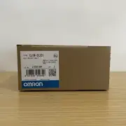 Omron CJ1W-OC201 mounted in a CJ-series PLC rack driving 8 mixed-voltage loads (230 VAC solenoid, 24 VDC relay coil, 120 VAC indicator) — demonstrating the independent contact architecture