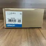 Omron CJ1W-OD212 16-point PNP output unit — side view showing the CJ bus connector strip on the left for mounting on the CJ-series backplane, and the unit-width 31 mm slim form factor