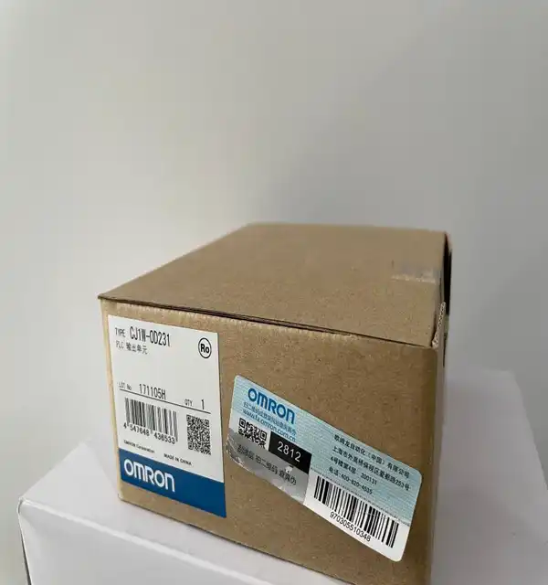 Omron CJ1W-OD231 output unit - front face showing the Fujitsu FCN-361J040-AU 40-pin connector socket and the orange LED status row