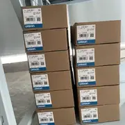 CJ1W-OD261 box label showing the 64-point count, NPN (sinking) output type, 0.3 A per point / 6.4 A per unit rating, and the DC 12-24 V load voltage marking