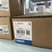 Omron CJ2H-CPU64-EIP PLC CPU unit — side view showing the compact 90 × 65 × 49 mm form factor with the backplane connector on the left side for CJ1W I/O modules and the option-board slot cover on the front