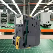 Omron CJ2M-CPU14 PLC CPU unit — front view showing the 31 mm wide body with USB Type-B programming port on the top face, RS-232C DB-9 port on the bottom face, and the indicator LEDs (RUN, ERR, INH, PRPHL) visible across the front
