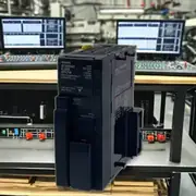 Omron CJ2M-CPU14 PLC CPU unit — side view showing the slim 90 × 65 × 31 mm form factor with the backplane connector on the left side for CJ1W I/O modules and the option-board slot cover on the front