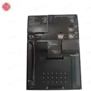 Omron CJ2M-CPU33 PLC CPU module — installed in a CJ-series CPU rack between a CJ1W-PA202 power supply and a CJ1W-ID211 input unit, with the USB and EtherNet/IP ports visible on the front face for programming and tag data link connection