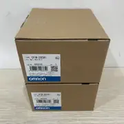 Omron CP1W-20EDR1 — side of the carton with the specification sticker and barcode