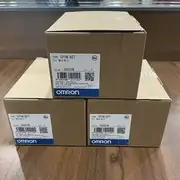 Omron CP1W-8ET — top label close-up showing the model number and the NPN sink output marking