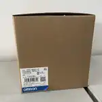 Omron CP2E-N40DT-D — top face showing the 24 VDC supply terminal block on the left, the two RJ45 Ethernet ports side by side, the USB programming port, and the option board slot cover