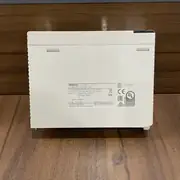 Omron CS1W-CT021 high-speed counter unit in the shipping carton with the type label visible