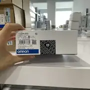 Omron CS1W-EIP21S CS-series EtherNet/IP unit in the shipping carton with the type label visible
