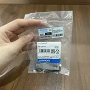 Omron D4A-A00 limit switch — top label close-up showing model code and SPDT double-break rating