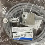 Omron D4C-1220 slim limit switch — front view showing the 16 mm compact die-cast aluminum housing with the roller lever in vertical position, the 3 m VCTF oil-resistant cable exiting the rear, and the orange operation indicator LED