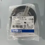 Omron E2E-S05S12-WC-B1 inductive proximity sensor — 25 mm body length scale and 14 mm thread length visible against ruler