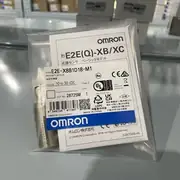 Omron E2E-X8B1D18-M1 — rear view showing the M12 4-pin connector and the cable strain relief on the back of the sensor