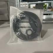E3FA-BP12 2M sensors in sealed Omron-branded bags, with the M18 ABS body and 2 m cable visible through the packaging