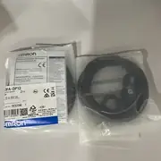 Omron E3FA-DP12 diffuse-reflective photoelectric sensor — sensitivity adjustment potentiometer under rear cover
