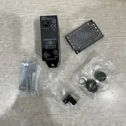 Omron E3JM-R4M4T-G Photoelectric Sensor Retroreflective Type — installation view