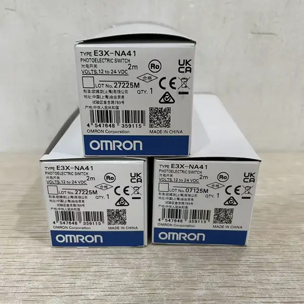 Omron E3X-NA41 2M fiber amplifier — front face with 8-turn sensitivity potentiometer and orange stability LED