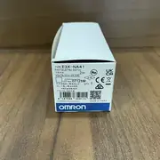 Omron E3X-NA41 2M fiber amplifier — right side with 2m pre-wired cable and fiber head connector port
