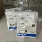 Omron E3Z-B86 — top label close-up showing the part number, the IP67 rating, and the CE mark on the cuboid PBT housing