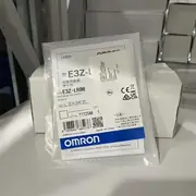 Omron E3Z-LR86 — rear face showing the sensitivity adjuster, the Light-ON / Dark-ON selector switch, and the M8 4-pin connector pin layout