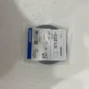 Omron E3Z-LS61 — anti-static sealed bag with the E3Z-LS61 PHOTOELECTRIC SWITCH type label, OMRON wordmark, CE / RoHS / UKCA marks, and "VOLTS 12 to 24V DC / 2m" markings