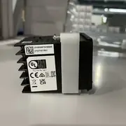 Omron E5CC-QX2ASM-802 — front view of the 48×48 mm black housing showing the 15.2 mm-tall white PV display, the secondary SV row, the four front keys, and the model label