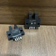 Omron EE-SX670 slot photomicrosensor — EE-1001 connector-system harness with brown/blue/black/pink colour-coded wires