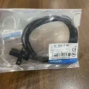 Omron EE-SX672-WR slot sensor — right side with 1m pre-wired cable exit and 4-lead wiring