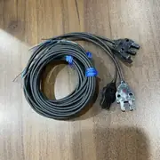Omron EE-SX870 slim-cable slot photomicrosensor — side view showing the U-slot geometry with the IR LED on one side and the phototransistor on the other; the slim 2 m PVC cable exits from the rear with red, black, white conductors per IEC color code