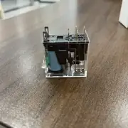 Omron G2R-2-SND DC24V DPDT 8-pin plug-in relay — top view showing the 8 pin arrangement, the label panel showing the coil voltage (24 VDC) and the contact configuration (DPDT)