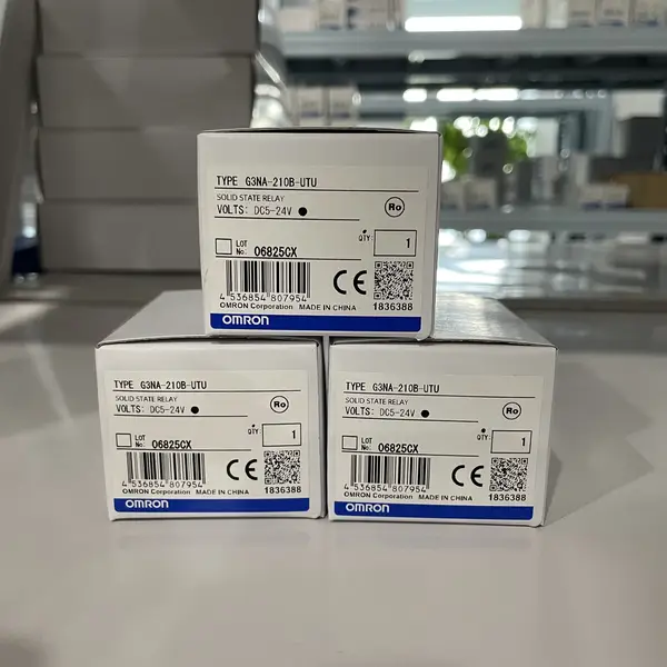 Omron G3NA-210B-UTU DC5-24 solid state relay — front view showing the screw terminal block (4 terminals: +in, -in, output, output) and the LED status indicator on the top face