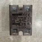 Omron G3NA-D210B-UTU DC5-24 solid state relay — label close-up showing OMRON G3NA-D210B-UTU, LOAD 5-200VDC 10A, INPUT 5-24VDC, MADE IN CHINA, with CE / UKCA / EAC / UL / CSA certification marks and LOT 11522CX