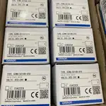 Omron G3NA-D210B-UTU DC5-24 solid state relay — six white Omron retail boxes stacked vertically with consistent TYPE G3NA-D210B-UTU SOLID STATE RELAY VOLTS: DC5-24V QTY 1 LOT No. 11522CX label markings on each box