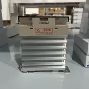 Omron G3PE-225B DC12-24V solid state relay — top label close-up showing the model number G3PE-225B DC12-24V, the 25 A / 100-240 VAC / 12-24 VDC ratings, and the UL / CSA / TÜV certification marks