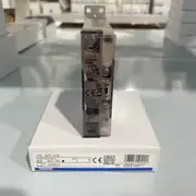 Omron G3PE-225B DC12-24V solid state relay — installed on a 35 mm DIN rail in a control cabinet controlling a 5 kW 230 VAC injection-molding heater band, with the integrated heat sink dissipating 40 W at full load and the LED indicator showing the ON state