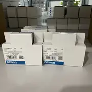 Omron H3DS-ML timer — front panel with mode dial, range dial, time setting dial and dual indicator LEDs