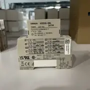 Omron H3DS-ML timer — 17.5 mm DIN-rail housing showing slim side profile and terminal block face