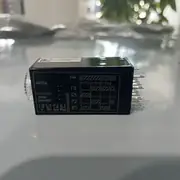 Omron H3YN-4-B DC24 mini timer in the shipping carton with the type label visible