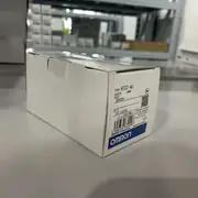 Omron H7CC-AU — top label close-up showing the part number, the AC100-240 V supply rating, the cULus and EN61010-1 marks, and the input type DIP switch positions