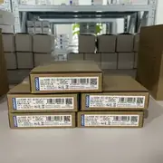 K8AK-AS1 box label showing the model code, 24 VAC/DC supply rating, and current-range sub-family marking